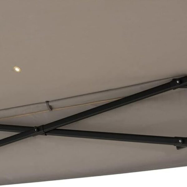 A close-up view of the underside of the 10.8 ft Pop-Up Gazebo Party Tent with Sheer Mesh Curtains, showing its beige canopy, sturdy metal frame, and a small light embedded in the fabric.